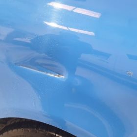 Renault Clio Dent Removal and paint scratch repair in Nottingham by Scratchmaster: Click Here To View Larger Image